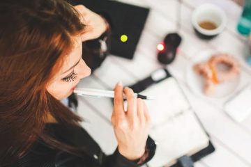 Working Woman Biting Pen